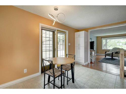 1419 Lake Ontario Road Se, Calgary, AB - Indoor Photo Showing Dining Room