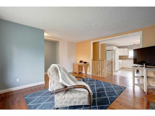 1419 Lake Ontario Road Se, Calgary, AB - Indoor Photo Showing Living Room