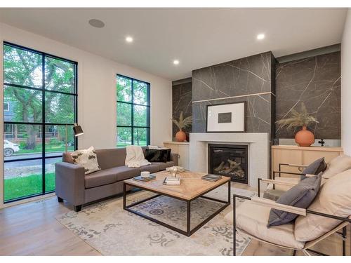 1426 4A Street Nw, Calgary, AB - Indoor Photo Showing Living Room With Fireplace