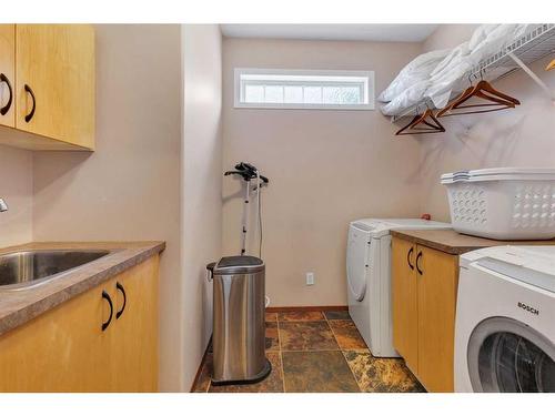 98 Crestbrook Hill Sw, Calgary, AB - Indoor Photo Showing Laundry Room
