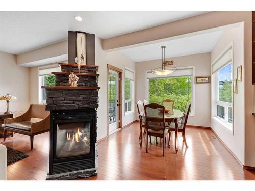 98 Crestbrook Hill Sw, Calgary, AB - Indoor With Fireplace