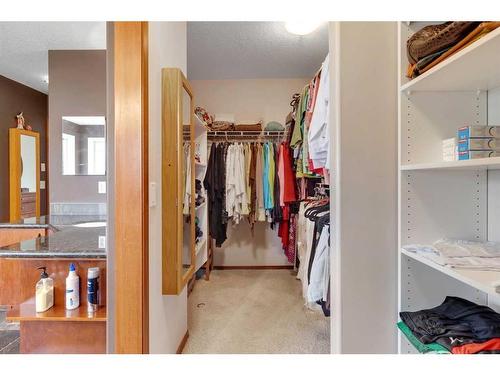 98 Crestbrook Hill Sw, Calgary, AB - Indoor With Storage