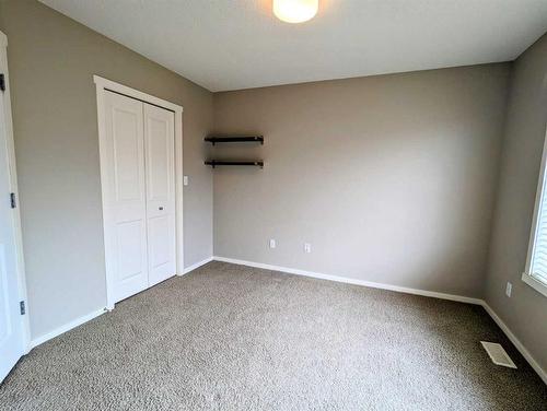 2109-125 Panatella Way Nw, Calgary, AB - Indoor Photo Showing Other Room