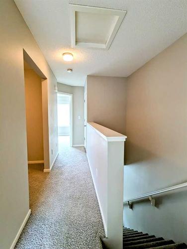 2109-125 Panatella Way Nw, Calgary, AB - Indoor Photo Showing Other Room