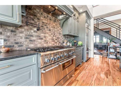 252121 2157 Drive West, Rural Foothills County, AB - Indoor Photo Showing Kitchen With Upgraded Kitchen