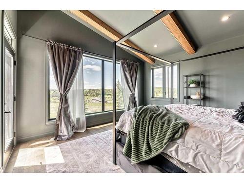 252121 2157 Drive West, Rural Foothills County, AB - Indoor Photo Showing Bedroom