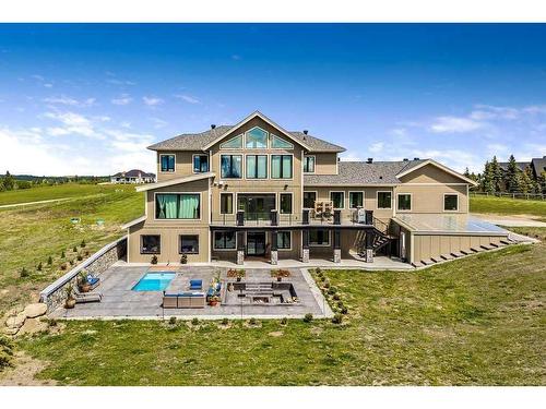 252121 2157 Drive West, Rural Foothills County, AB - Outdoor With In Ground Pool With Deck Patio Veranda