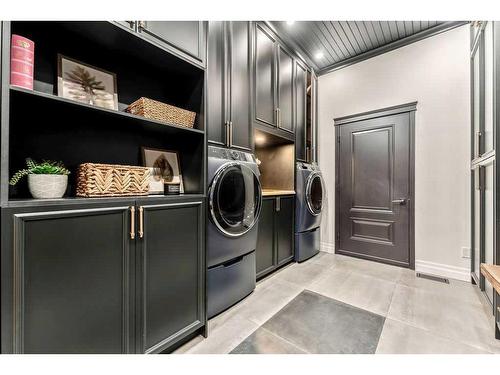 252121 2157 Drive West, Rural Foothills County, AB - Indoor Photo Showing Laundry Room