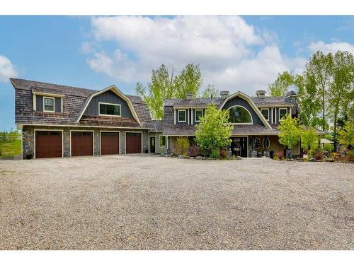 84 Eagle Butte Ranch, Rural Rocky View County, AB - Outdoor With Facade