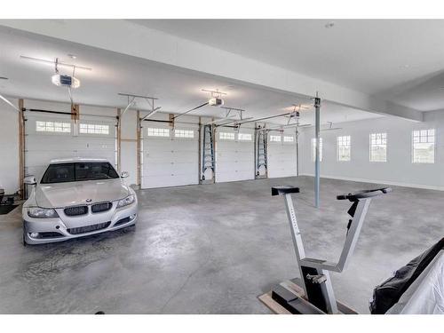 84 Eagle Butte Ranch, Rural Rocky View County, AB - Indoor Photo Showing Garage