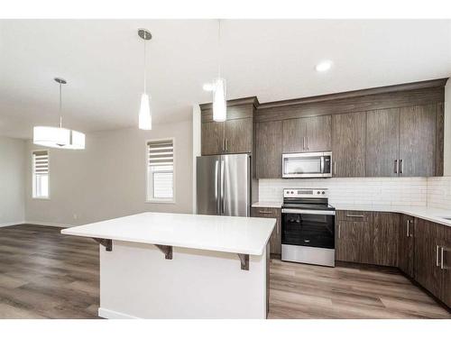 122 Cornerbrook Manor Ne, Calgary, AB - Indoor Photo Showing Kitchen With Upgraded Kitchen