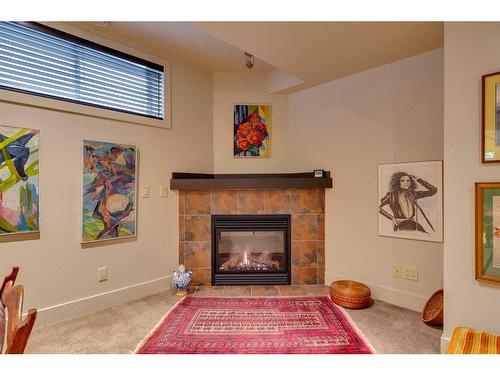 2043 49 Avenue Sw, Calgary, AB - Indoor Photo Showing Living Room With Fireplace