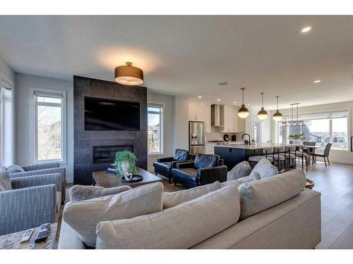24 Royal Elm Green Nw, Calgary, AB - Indoor Photo Showing Living Room With Fireplace