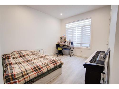 79 Harvest Square, Claresholm, AB - Indoor Photo Showing Bedroom