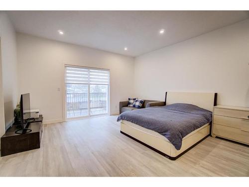 79 Harvest Square, Claresholm, AB - Indoor Photo Showing Bedroom