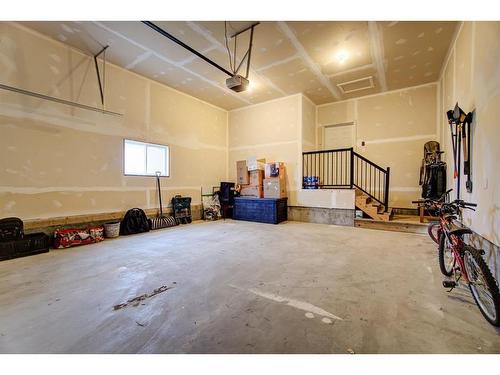 79 Harvest Square, Claresholm, AB - Indoor Photo Showing Garage