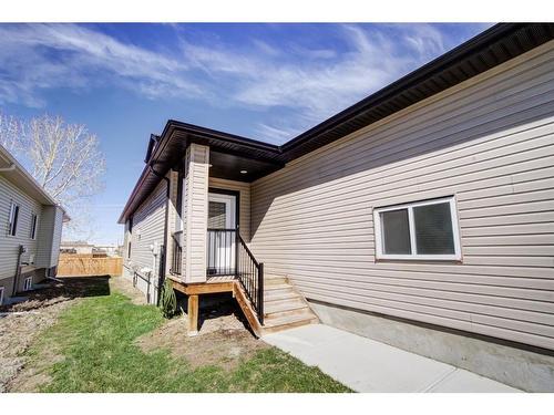 79 Harvest Square, Claresholm, AB - Outdoor With Exterior