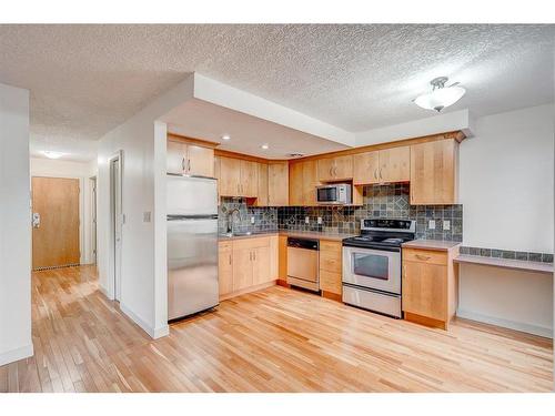 202-1309 14 Avenue Sw, Calgary, AB - Indoor Photo Showing Kitchen