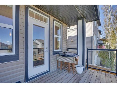 168 Heritage Boulevard, Cochrane, AB - Outdoor With Deck Patio Veranda With Exterior