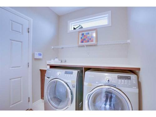 168 Heritage Boulevard, Cochrane, AB - Indoor Photo Showing Laundry Room