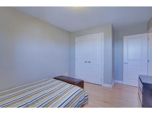 168 Heritage Boulevard, Cochrane, AB - Indoor Photo Showing Bedroom