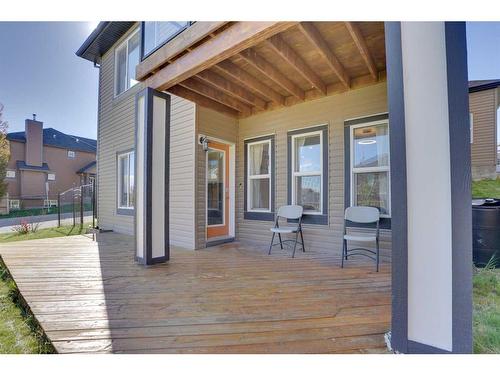 168 Heritage Boulevard, Cochrane, AB - Outdoor With Deck Patio Veranda With Exterior