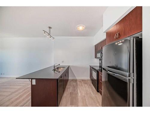 1511-8880 Horton Road Sw, Calgary, AB - Indoor Photo Showing Kitchen