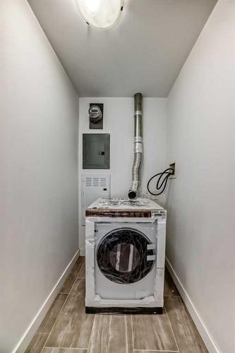 1511-8880 Horton Road Sw, Calgary, AB - Indoor Photo Showing Laundry Room