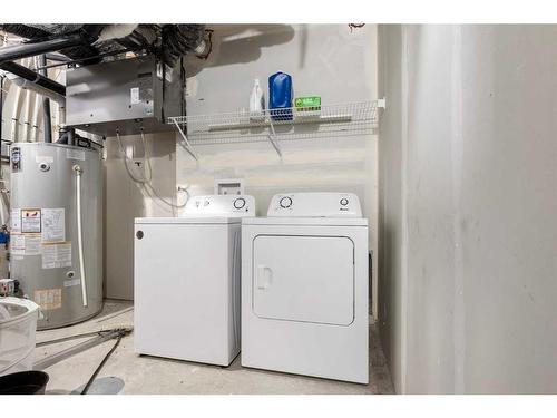 388 Lucas Boulevard Nw, Calgary, AB - Indoor Photo Showing Laundry Room