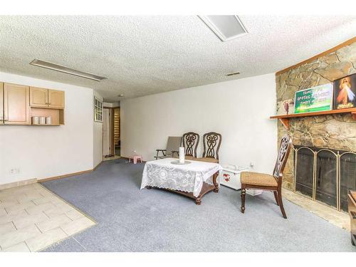 5548 4 Avenue Ne, Calgary, AB - Indoor With Fireplace