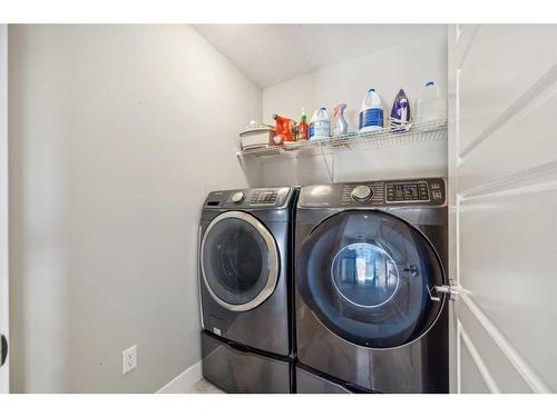 1471 Ranch Road, Carstairs, AB - Indoor Photo Showing Laundry Room