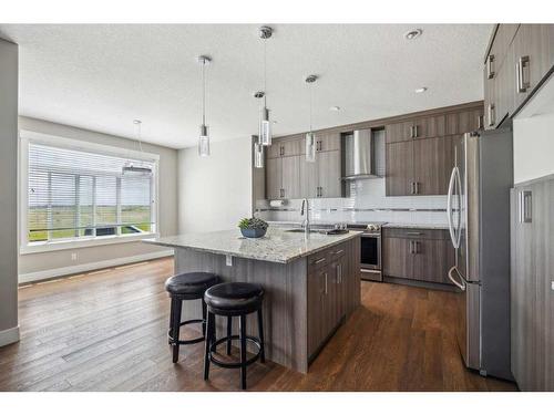 1471 Ranch Road, Carstairs, AB - Indoor Photo Showing Kitchen With Stainless Steel Kitchen With Double Sink With Upgraded Kitchen