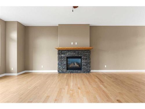 6511 57 Street, Olds, AB - Indoor Photo Showing Living Room With Fireplace
