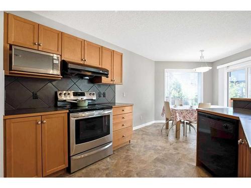 65 Everwoods Close Sw, Calgary, AB - Indoor Photo Showing Kitchen