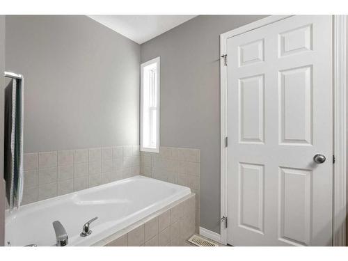 65 Everwoods Close Sw, Calgary, AB - Indoor Photo Showing Bathroom