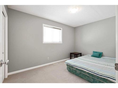 65 Everwoods Close Sw, Calgary, AB - Indoor Photo Showing Bedroom