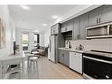 320-3932 University Avenue Nw, Calgary, AB  - Indoor Photo Showing Kitchen With Stainless Steel Kitchen With Upgraded Kitchen 