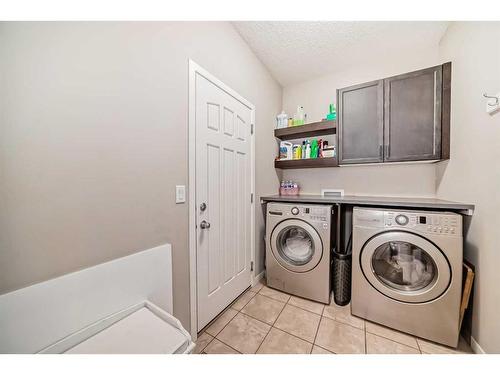 248 Panatella Cape Nw, Calgary, AB - Indoor Photo Showing Laundry Room