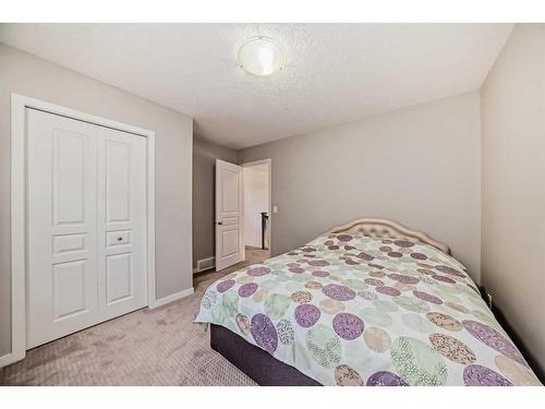 248 Panatella Cape Nw, Calgary, AB - Indoor Photo Showing Bedroom