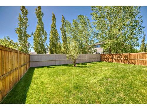 248 Panatella Cape Nw, Calgary, AB - Outdoor With Backyard