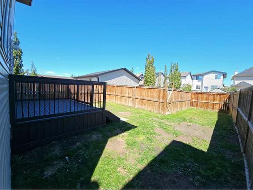 184 Silverado Plains Close Sw, Calgary, AB - Outdoor With Backyard