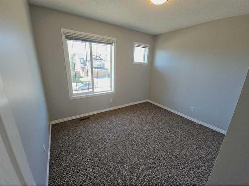 184 Silverado Plains Close Sw, Calgary, AB - Indoor Photo Showing Other Room