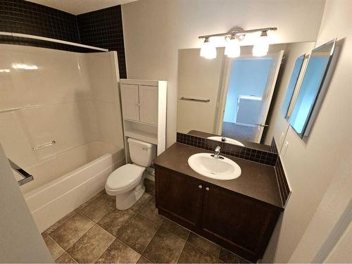 184 Silverado Plains Close Sw, Calgary, AB - Indoor Photo Showing Bathroom