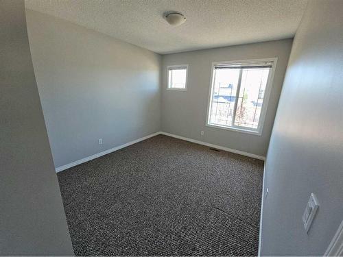 184 Silverado Plains Close Sw, Calgary, AB - Indoor Photo Showing Other Room