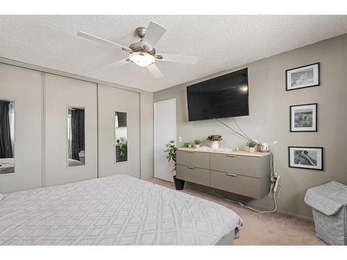 1844 Meadowbrook Drive Se, Airdrie, AB - Indoor Photo Showing Bedroom