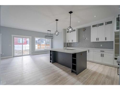 1362 Scarlett Ranch Boulevard, Carstairs, AB - Indoor Photo Showing Kitchen With Upgraded Kitchen