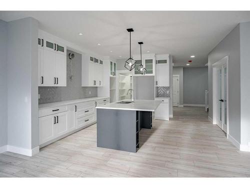 1362 Scarlett Ranch Boulevard, Carstairs, AB - Indoor Photo Showing Kitchen With Upgraded Kitchen