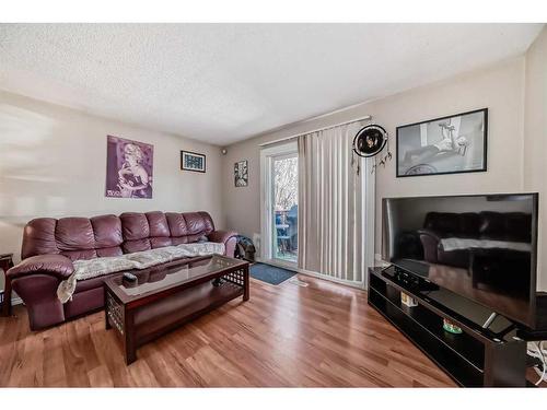 59 Falchurch Road Ne, Calgary, AB - Indoor Photo Showing Living Room