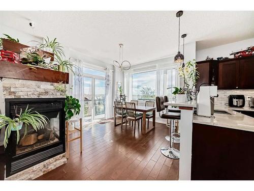 121 Cortina Bay Sw, Calgary, AB - Indoor With Fireplace