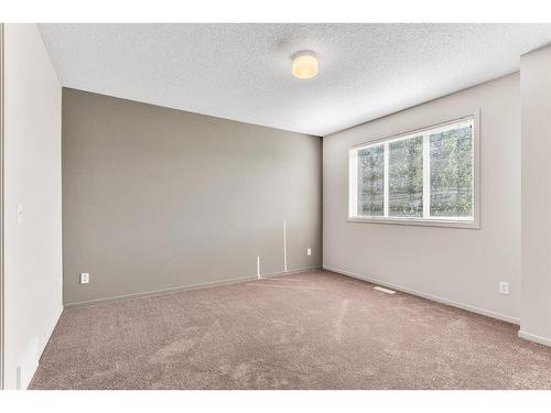 267 Copperstone Cove Se, Calgary, AB - Indoor Photo Showing Other Room